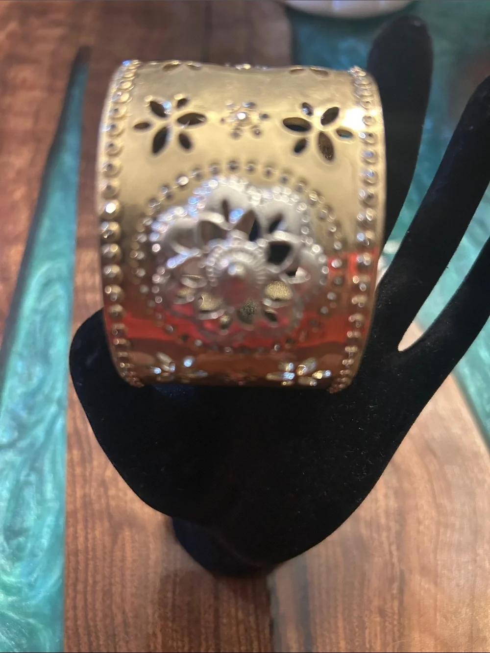 Lucky gold-tone floral cutout cuff bracelet intricate medallion center